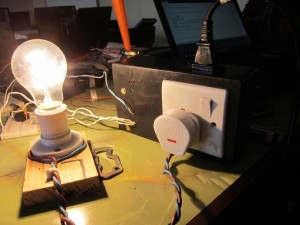 Testing out the S.O.S.; the lightbulb is modeling the suction pump device.