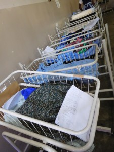 Line of cots in the low-risk section of the neonatal ward at Kamuzu Central Hospital